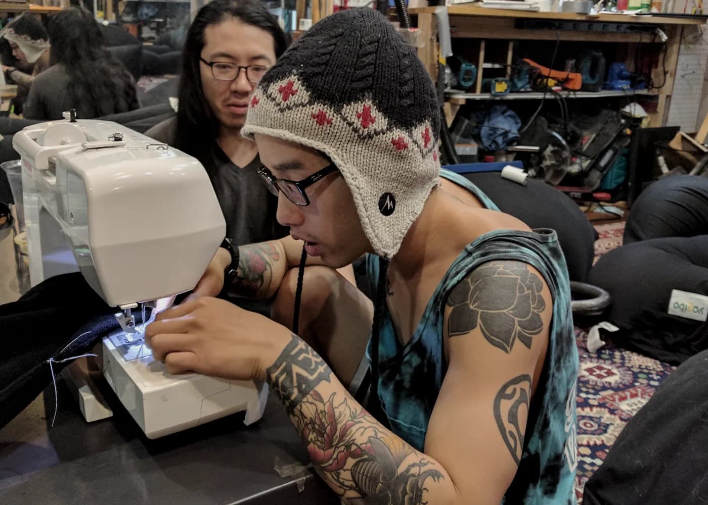 People working at sewing machines